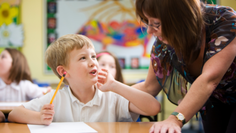 Teacher Talking Directly to Child