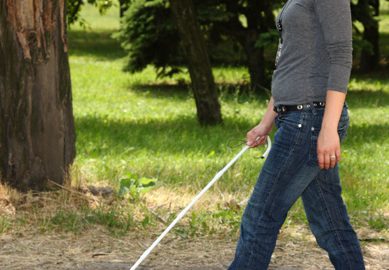 Blind Woman Using Cane