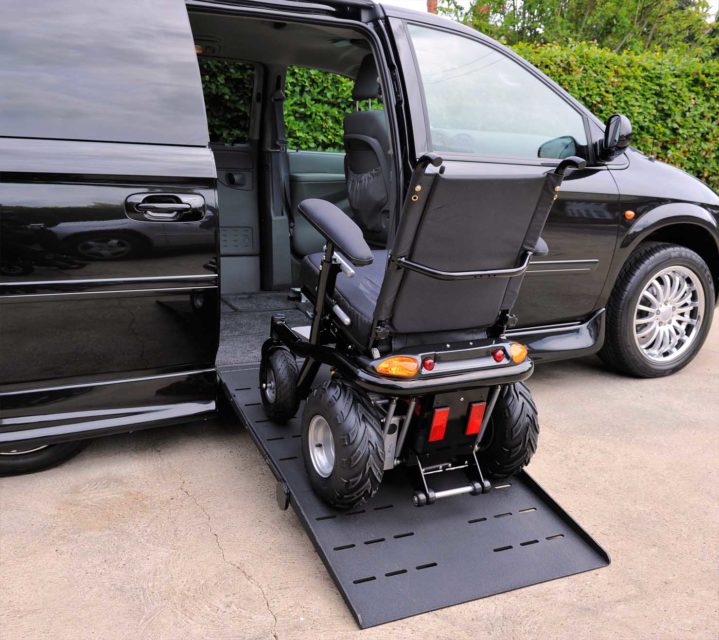 Vehicle with wheelchair ramp